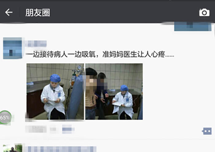 懷孕七月準媽媽醫(yī)生邊吸氧邊給人看病