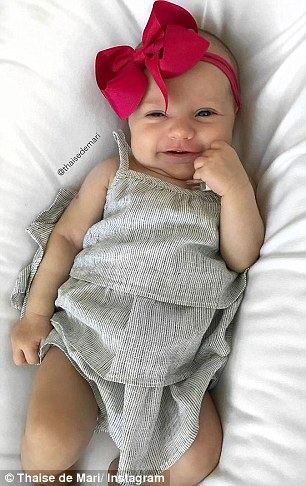 巴西一女?huà)雱偝錾捅槐?lái)秒拍全家福（組圖）