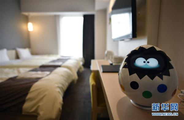 恐龍機器人是服務員！ 日本現“奇異賓館”（組圖）