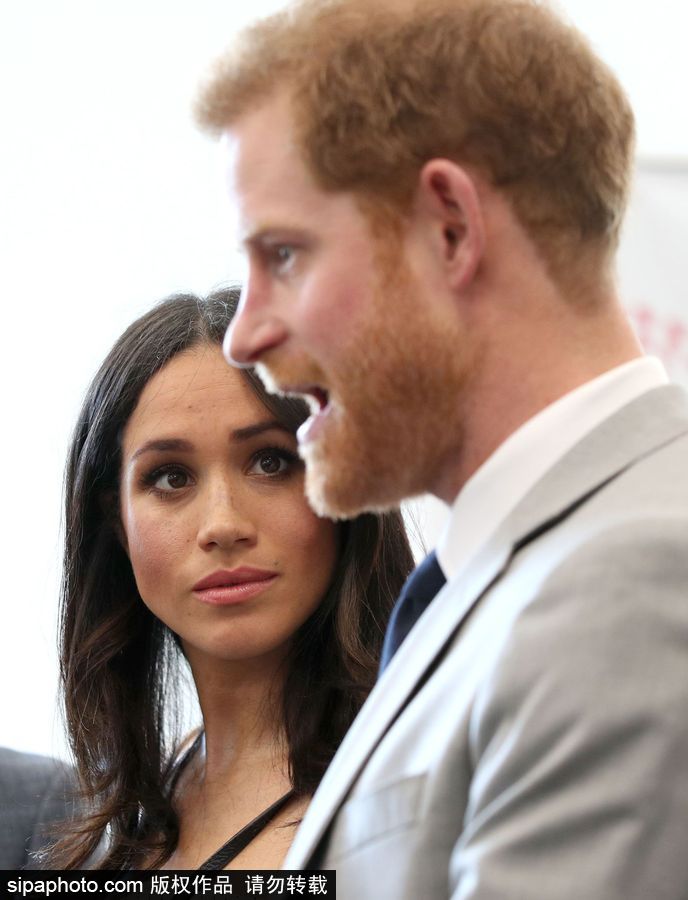 英國哈里王子攜準(zhǔn)王妃梅格漢·馬克爾出席活動恩愛有加