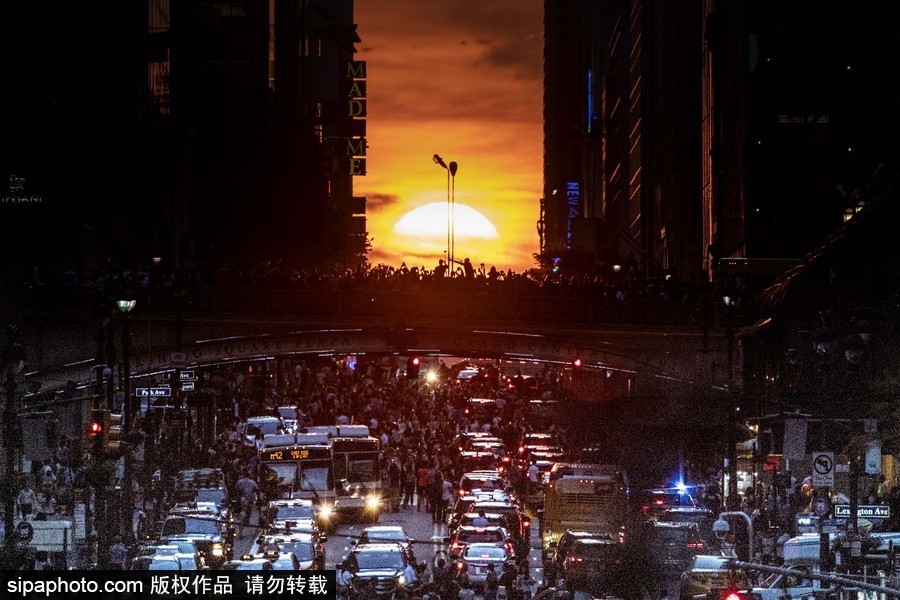 美國紐約再現曼哈頓懸日 街頭擁堵水泄不通