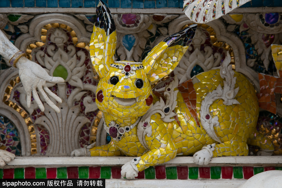 泰國曼谷一廟宇驚現(xiàn)超人、皮卡丘等動漫雕像 跨界裝飾創(chuàng)意無窮！